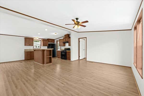 11102 WOOD RUN CIR, SOUTH LYON, MI 48178 - Image 1