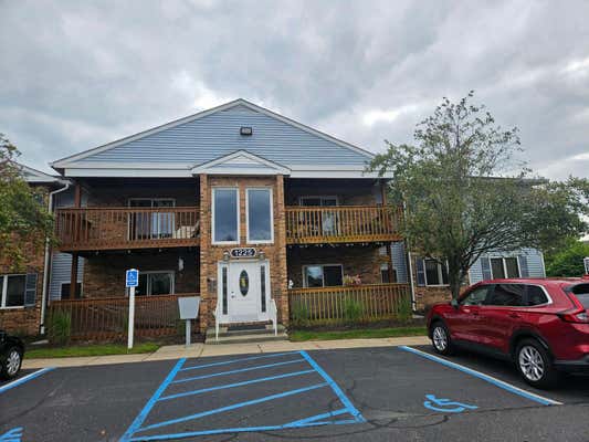 1225 HARBOUR DR APT 27, TRENTON, MI 48183 - Image 1