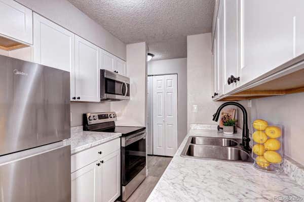 50 E HIGHLINE CIR UNIT 104, CENTENNIAL, CO 80122 - Image 1