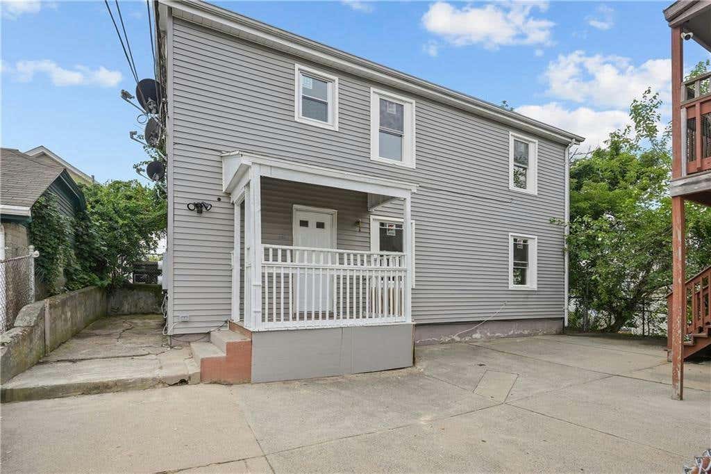 136 EARLE ST, CENTRAL FALLS, RI 02863, photo 1 of 50