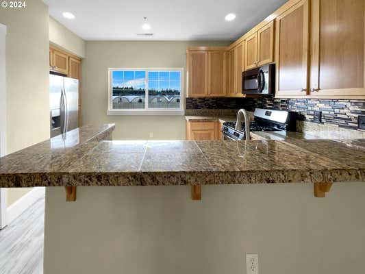 18485 SW STEPPING STONE DR APT 51, BEAVERTON, OR 97003, photo 4 of 25