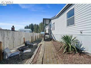 902 ACACIA AVE, GARIBALDI, OR 97118 - Image 1