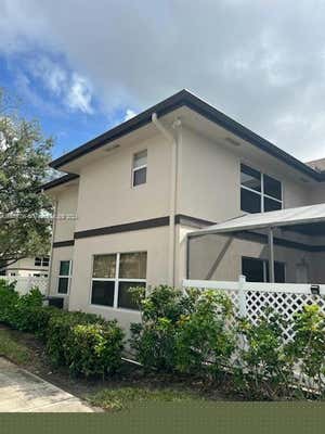 5 AMHERST CT APT D, ROYAL PALM BEACH, FL 33411 - Image 1