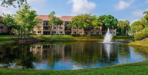 8955 WILES RD APT 308, CORAL SPRINGS, FL 33067 - Image 1