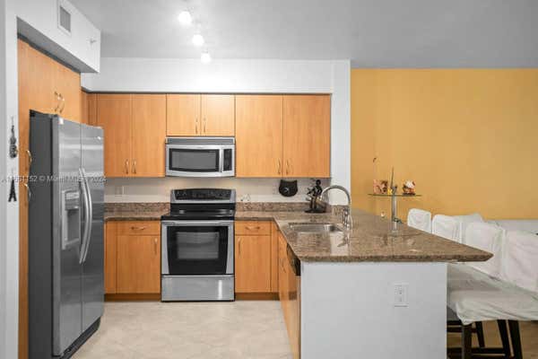 1830 RADIUS DR APT 1024, HOLLYWOOD, FL 33020, photo 4 of 42