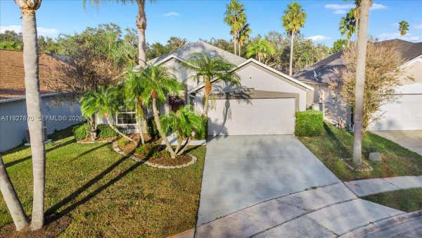 13923 TALLOWRIDGE CT, ORLANDO, FL 32837, photo 1 of 40