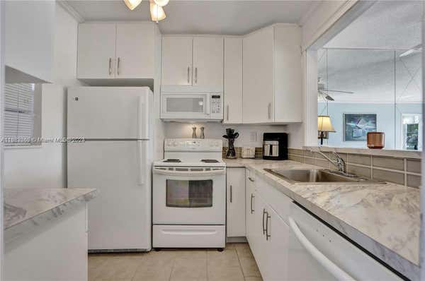 5000 NW 36TH ST APT 406, LAUDERDALE LAKES, FL 33319 - Image 1