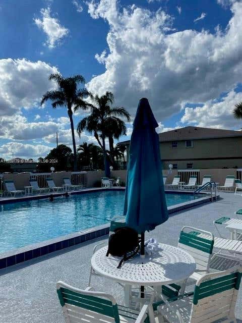 1556 SE ROYAL GREEN CIR # 203, PORT ST. LUCIE, FL 34952, photo 1 of 15