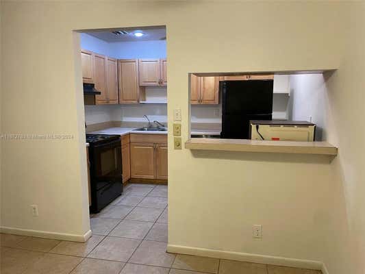 10441 MAHOGANY KEY CIR APT 103, MIAMI, FL 33196, photo 3 of 15