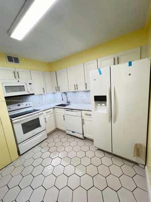 4152 INVERRARY DR APT 110, LAUDERHILL, FL 33319 - Image 1