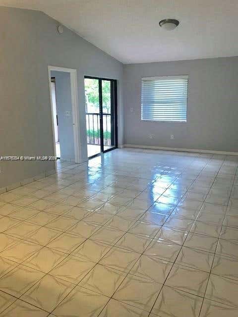 9810 HAMMOCKS BLVD APT 202, MIAMI, FL 33196, photo 1 of 10