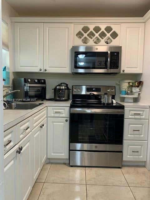 8460 SUNRISE LAKES BLVD APT 112, SUNRISE, FL 33322, photo 1 of 6