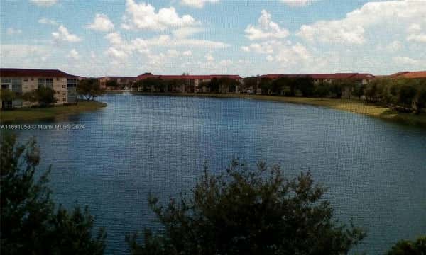 13100 SW 11TH CT APT 409C, PEMBROKE PINES, FL 33027 - Image 1