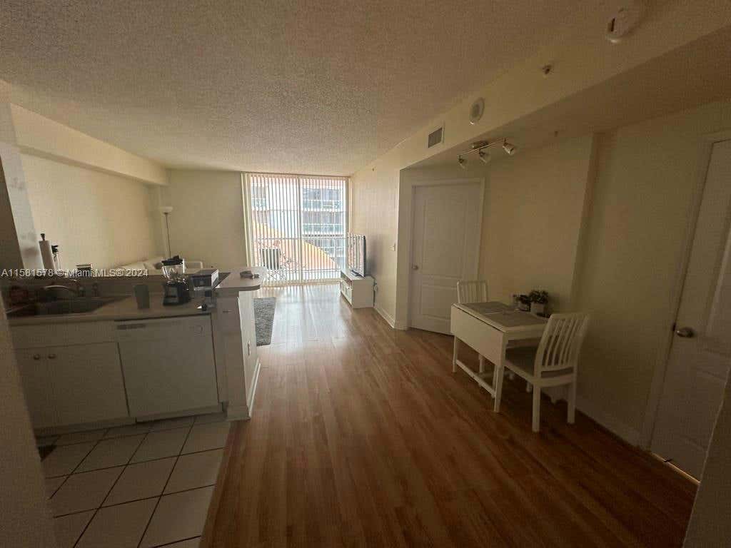 5077 NW 7TH ST APT 616, MIAMI, FL 33126, photo 1 of 8