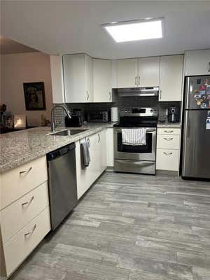 415 SE 11TH TER APT 205, DANIA BEACH, FL 33004 - Image 1