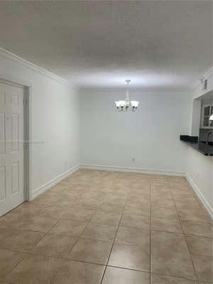 18880 NW 57TH AVE APT 107, HIALEAH, FL 33015 - Image 1