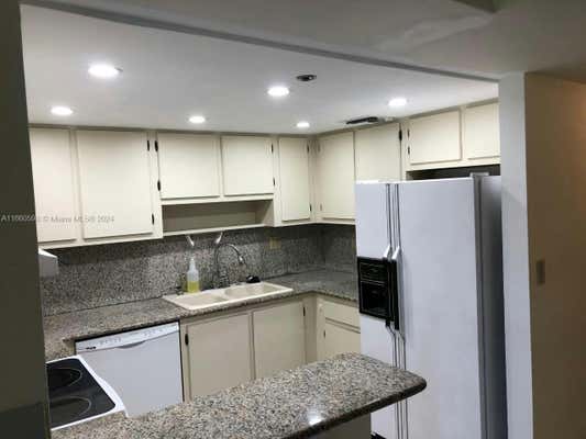 3100 W ROLLING HILLS CIR APT 103, DAVIE, FL 33328 - Image 1