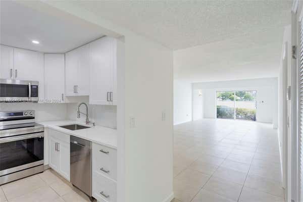 873 NE 195TH ST APT 107, MIAMI, FL 33179 - Image 1