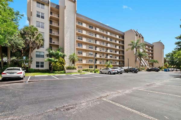 3300 W ROLLING HILLS CIR APT 701, DAVIE, FL 33328 - Image 1