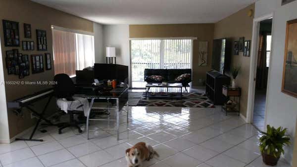 3300 SPANISH MOSS TER APT 301, LAUDERHILL, FL 33319 - Image 1