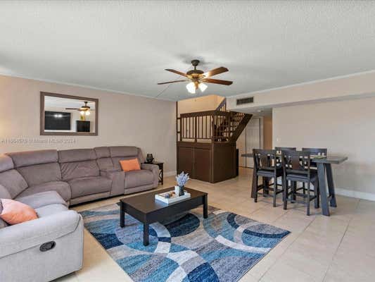 8401 W SAMPLE RD APT 28, CORAL SPRINGS, FL 33065 - Image 1