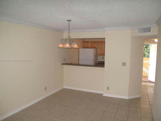 10007 TWIN LAKES DR # 25-O, CORAL SPRINGS, FL 33071 - Image 1