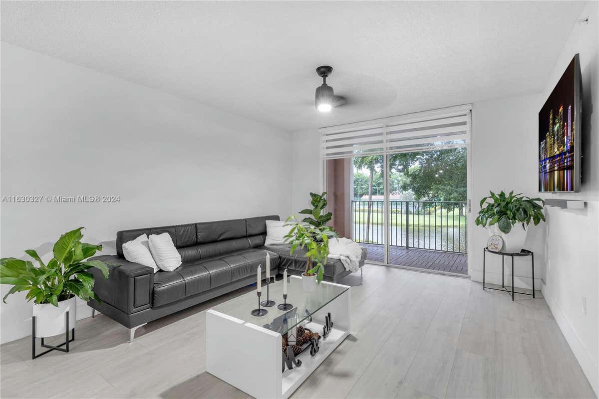 12142 SAINT ANDREWS PL APT 206, MIRAMAR, FL 33025, photo 1 of 38