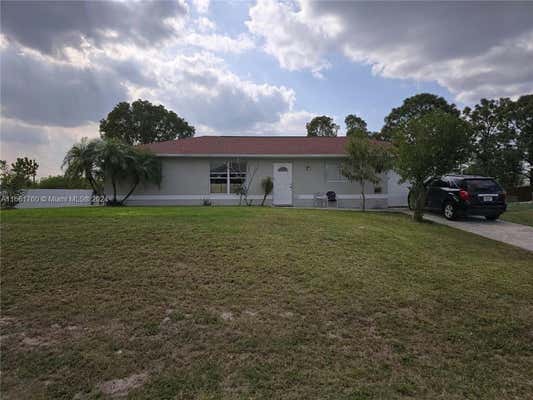 909 SALLY AVE N, LEHIGH ACRES, FL 33971 - Image 1