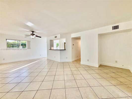 3405 NW 44TH ST APT 104, LAUDERDALE LAKES, FL 33309 - Image 1