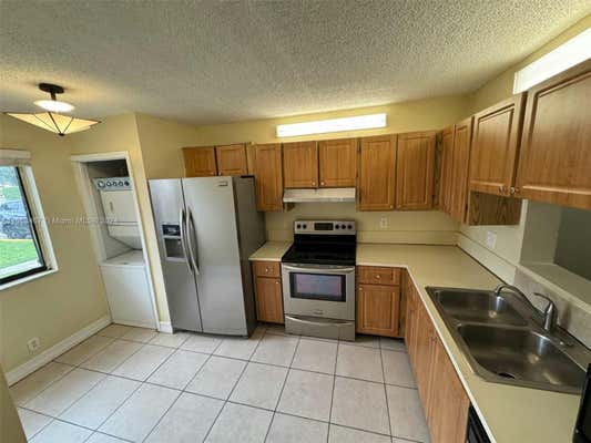 8041 SOUTHGATE BLVD APT H5, NORTH LAUDERDALE, FL 33068 - Image 1