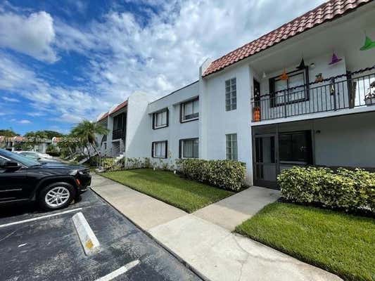 290 RACQUET CLUB RD APT 106, WESTON, FL 33326 - Image 1