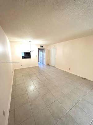 6570 ROYAL PALM BLVD APT 107J, MARGATE, FL 33063 - Image 1