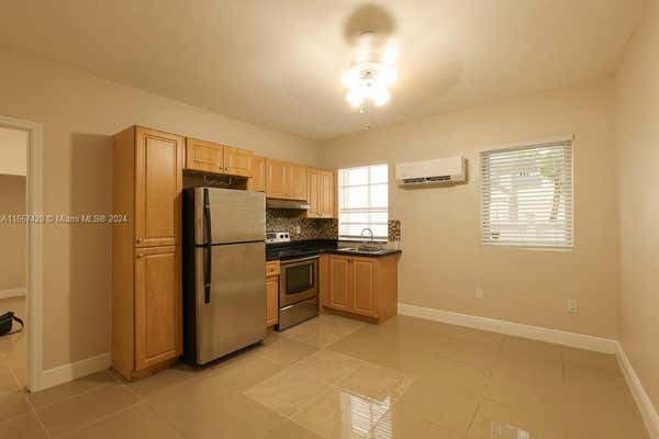 1021 NW 3RD ST APT 108, MIAMI, FL 33128 - Image 1