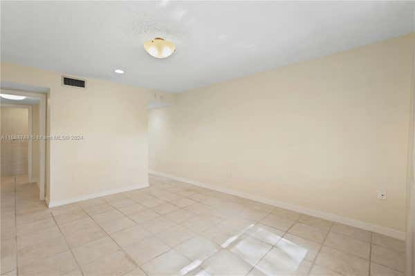 1205 MARIPOSA AVE APT 322, CORAL GABLES, FL 33146, photo 4 of 24