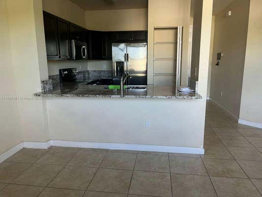 134 SE 28TH TER UNIT 21, HOMESTEAD, FL 33033 - Image 1