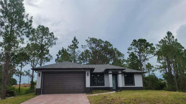 2712 11TH ST SW, LEHIGH ACRES, FL 33976 - Image 1