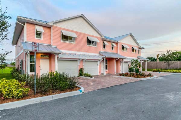 221 IVORY CORAL LN APT 102, MERRITT ISLAND, FL 32953 - Image 1