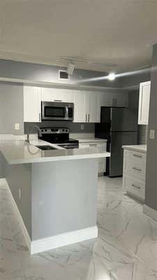 2620 S UNIVERSITY DR APT 105, DAVIE, FL 33328 - Image 1