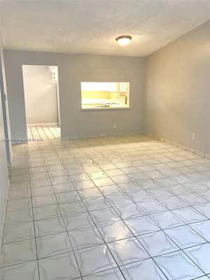 9810 HAMMOCKS BLVD APT 202, MIAMI, FL 33196, photo 4 of 10