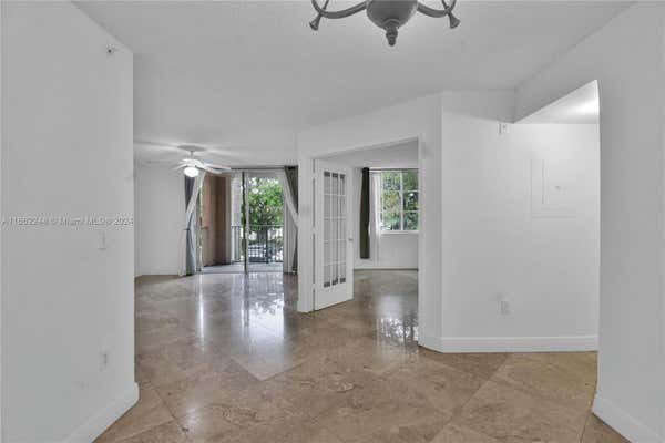 12160 SAINT ANDREWS PL APT 205, MIRAMAR, FL 33025 - Image 1