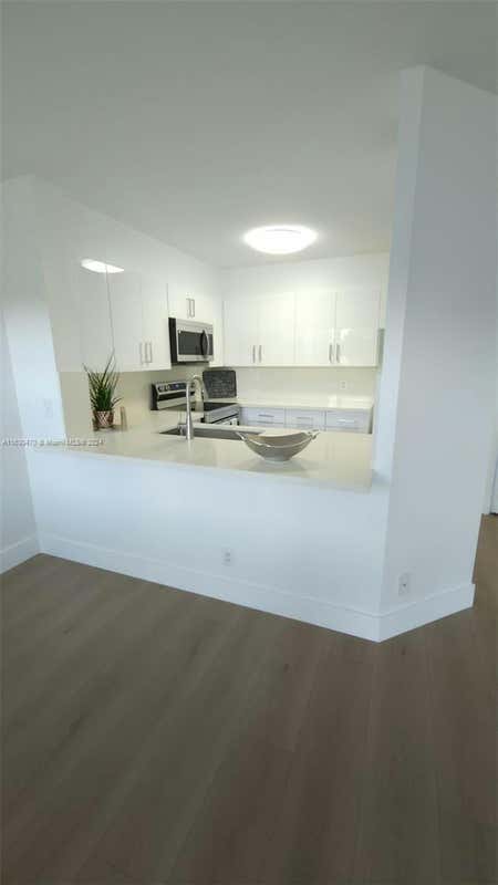 12950 SW 4TH CT APT 211H, PEMBROKE PINES, FL 33027, photo 1 of 30