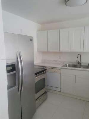 15221 NE 6TH AVE APT A307, MIAMI, FL 33162 - Image 1