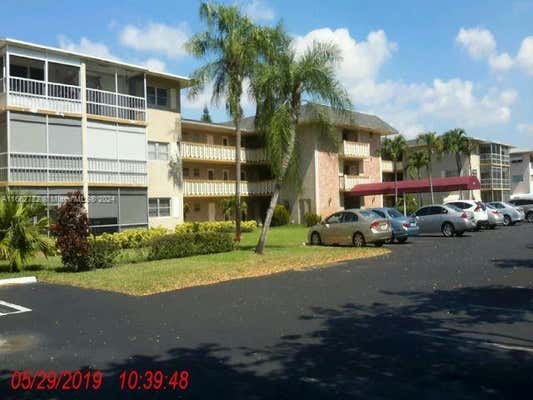 1000 HILLCREST CT APT 111, HOLLYWOOD, FL 33021 - Image 1