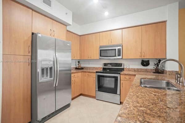 1830 RADIUS DR APT 1024, HOLLYWOOD, FL 33020, photo 3 of 42