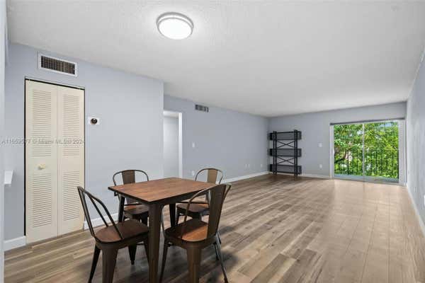 1890 W 56TH ST APT 1318, HIALEAH, FL 33012 - Image 1