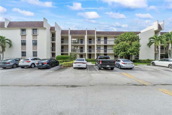 8441 FOREST HILLS DR APT 106, CORAL SPRINGS, FL 33065 - Image 1