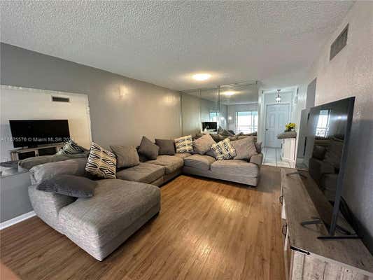 201 BERKLEY RD APT 210, HOLLYWOOD, FL 33024 - Image 1