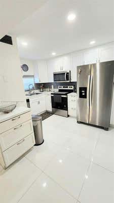 8930 S HOLLYBROOK BLVD APT 106, PEMBROKE PINES, FL 33025 - Image 1