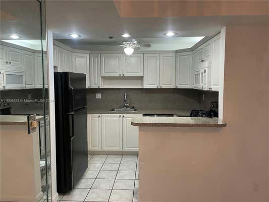 3100 W ROLLING HILLS CIR APT 108, DAVIE, FL 33328 - Image 1