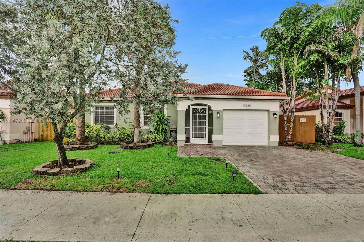 5520 NW 49TH AVE, COCONUT CREEK, FL 33073, photo 1 of 55